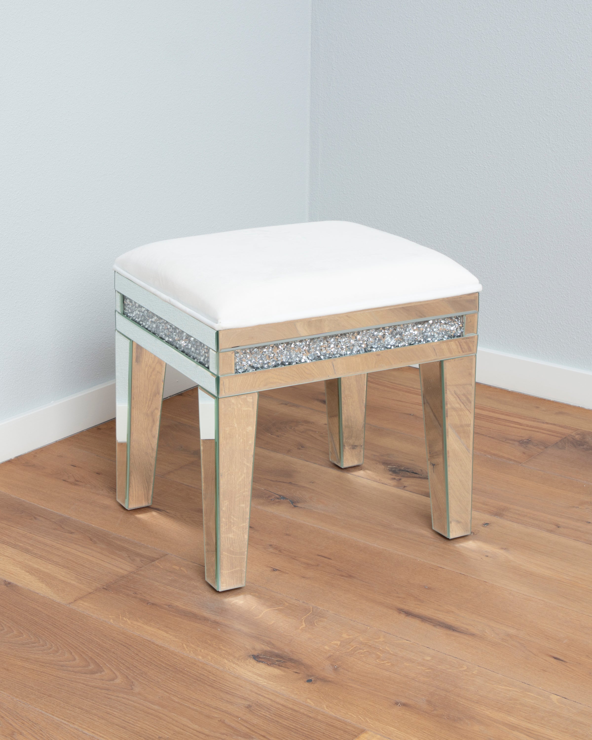 THE MIRRORED CRYSTAL STOOL